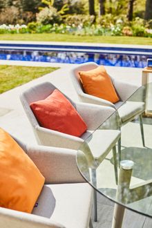 Photo 3 | Bridgman Casual Dining Collection | Features waterproof Richmond Armchairs and cushions which are ideal for enjoying all year round regardless of the weather.