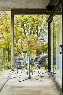 Header image  | Bridgman Casual Dining Collection |100cm Henley Glass and Aluminium Dining Table with 4 Remy Stacking Armchairs