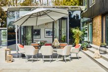 Photo 2 | Bridgman Casual Dining Collection | 230cm Henley Glass and Aluminium Dining Table with 8 Richmond Armchairs | £3,999