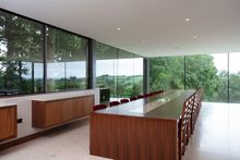 Ultra tall Invisio structural frameless glass envelopes the formal dining space with far reaching views of the East Coker countryside. 