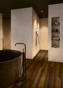 Impressive, Smoked Oak laminate (IM8261) from £29.99 per m2, Quick-Step, quick-step.co.uk