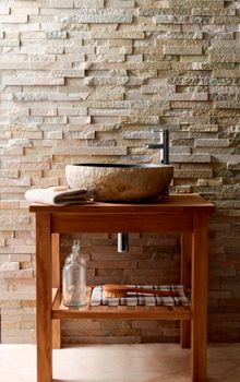 Pebble Basin, made from a stone bolder therefore each one is completely unique! £354 each. Roane Quartzite Maxi Splitface on wal